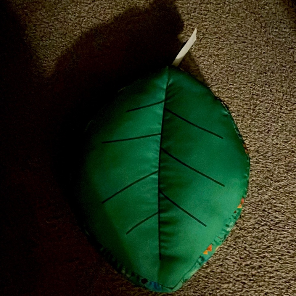 Pillow or seat shaped like a leaf